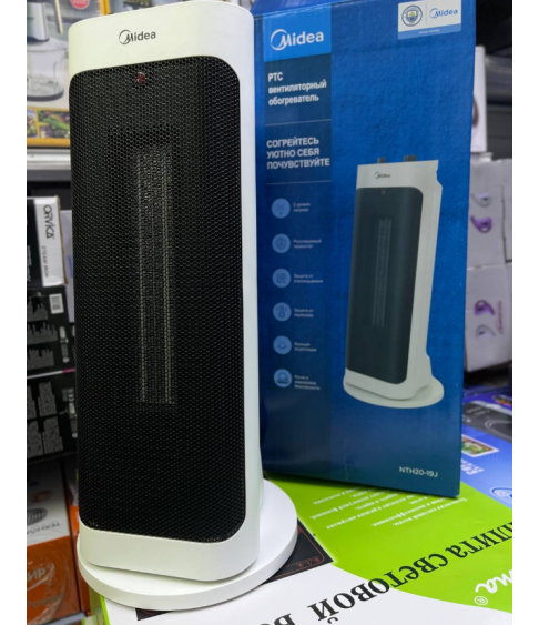 Midea PTC вентиляторный обогреватель (модель NTH20-19J). Midea PTC вентиляторный обогреватель (модель NTH20-19J).