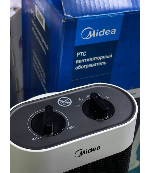 Midea PTC вентиляторный обогреватель (модель NTH20-19J). Midea PTC вентиляторный обогреватель (модель NTH20-19J).